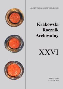 Okładka tomu 26 Krakowskiego Rocznika Archiwalnego. Na szarym polu trzy historyczne pieczęcie.